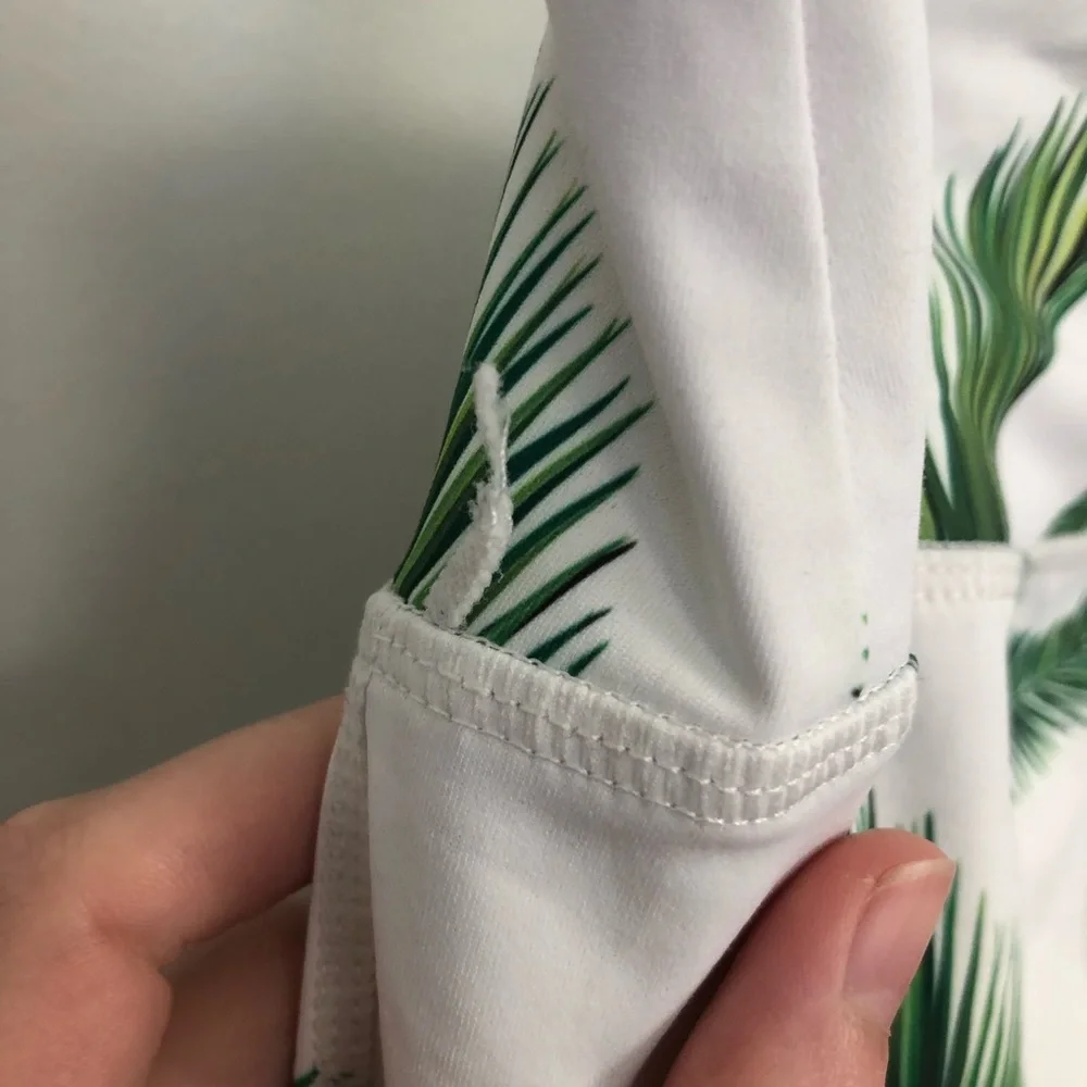 SLINKII 🌿 white tropics leggings size small